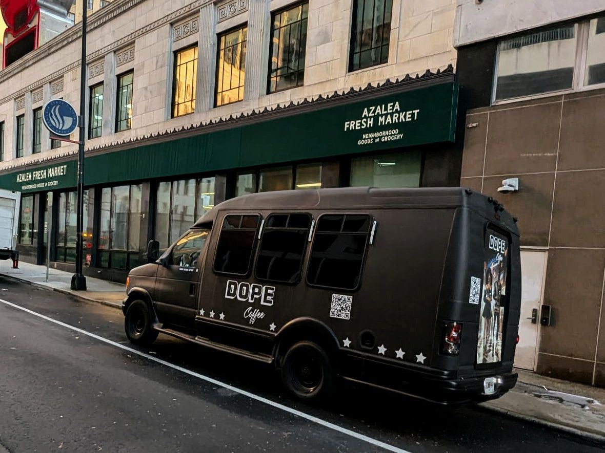 The Dope Coffee Cold Brew Bus on a downtown Atlanta street